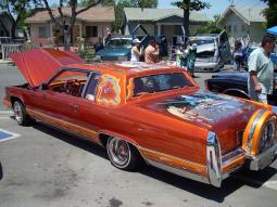 classic lowride car in orange red image.jpg