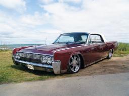 image of classic lowride cars in dark red.jpg