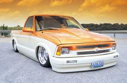 Orange and white lowride car picture.jpg