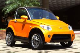 Funky new electric car in bright yellow.jpg