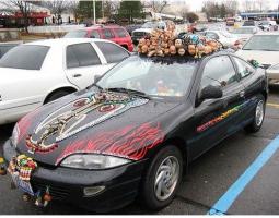 funky picture of car with great collection items.jpg