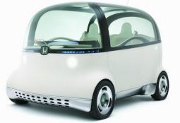 picture of a funky car_ a white Honda PUYO model.jpg