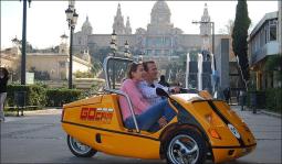 picture of a three-wheeler GoCar in yellow.jpg
