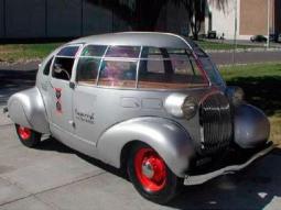 very funky car in silver and red.jpg