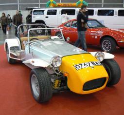 classic short funky car in silver and  yellow.jpg