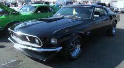 Black Mustang Muscle Car with a very cool looking car.jpg