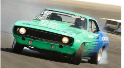 bright color muscle car in speed.jpg