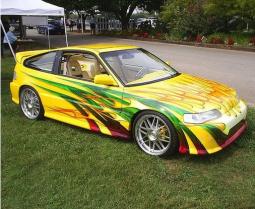 yellow custom car with other colorful paint lines.jpg