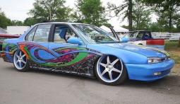 colorful custom car in blue colorfu paints.jpg
