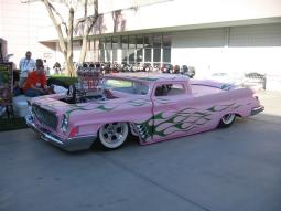 Cool custom car in light pink and green lines.jpg