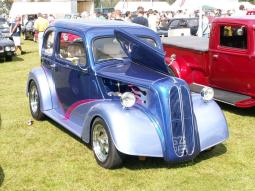blue vintage custom car with pink lines.jpg