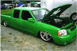 Green Nissan Frontier At Slammin and Jammin Car Show.jpg
