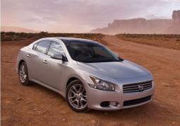 Very elegant silver Nissan car picture.JPG
