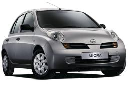 Dark silver Nissan car with interesting shape with four doors.JPG
