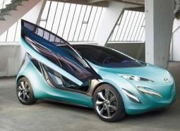 Light blue cute small car looking so cool with the doors.JPG