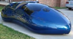 Very cool blue sport car in an extreme unique shape.JPG