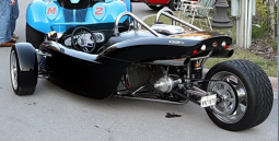 Unique convertable custome car in black.PNG