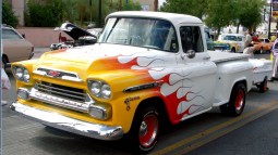 White custome car with yellow and red fire patterns.PNG