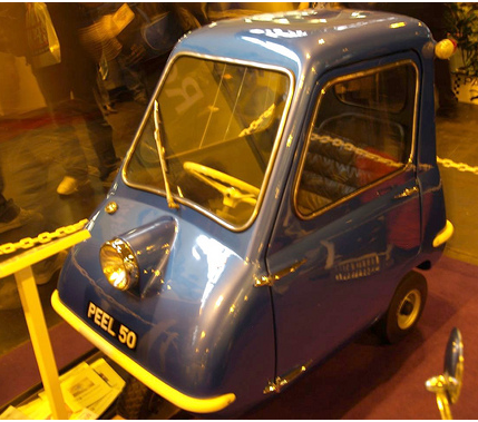 Peel P50 Micro Car in dark blue and yellow lines.PNG