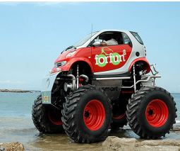 Smart car with gaint wheels picture.PNG
