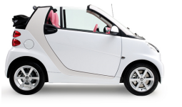 White smart car in convertable.PNG