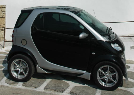 Picture of black smart car with silver patterns.PNG