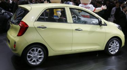 2012 Kia Picanto car in creamy yellow.PNG