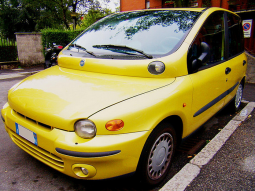Bright yellow Fiat car photos.PNG