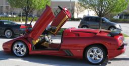a red Lamborghini Diablo MomoCorse car photo.jpg