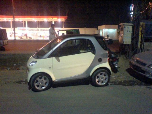 cool looking Smart car on the street picture.jpg