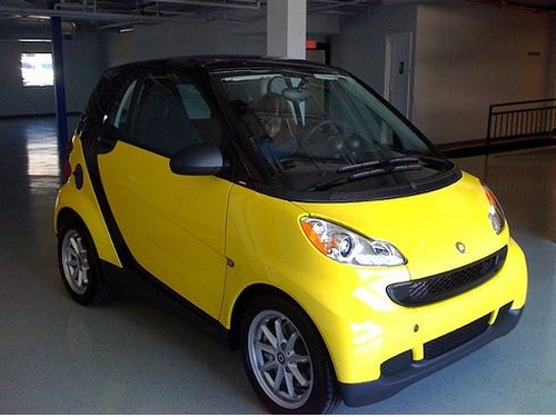 bright yellow Smart car images.jpg