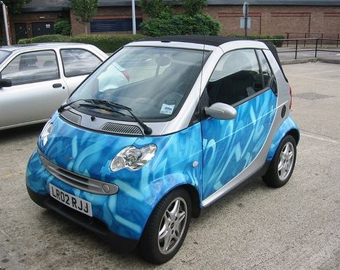 Light blue and grey Smart car image.jpg